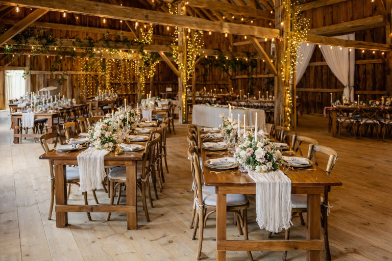 Rustic barn wedding reception setting 768x512