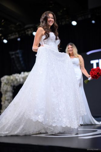 Canada's Bridal Show October 2026 - Bride twirling her train on the runway
