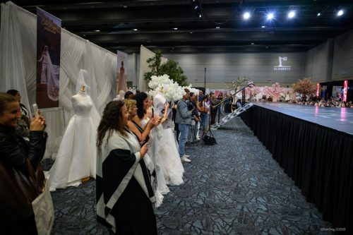 Canada's Bridal Show October 2026 - Guests filming the fashion show from the runway