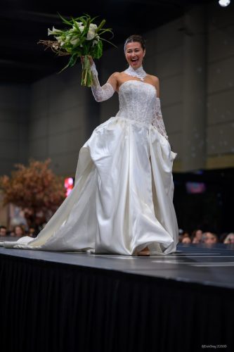 Canada's Bridal Show October 2026 - Bride raising her bouquet on the runway
