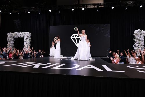 Canada's Bridal Show October 2026 - Brides tossing bouquets to the crowd at the main stage