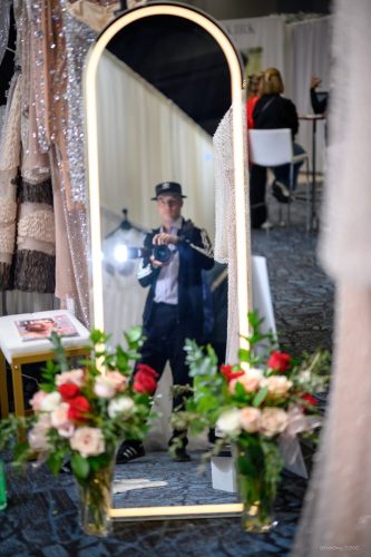 Canada's Bridal Show October 2026 - Photographer at work at a boutique booth's arched mirror